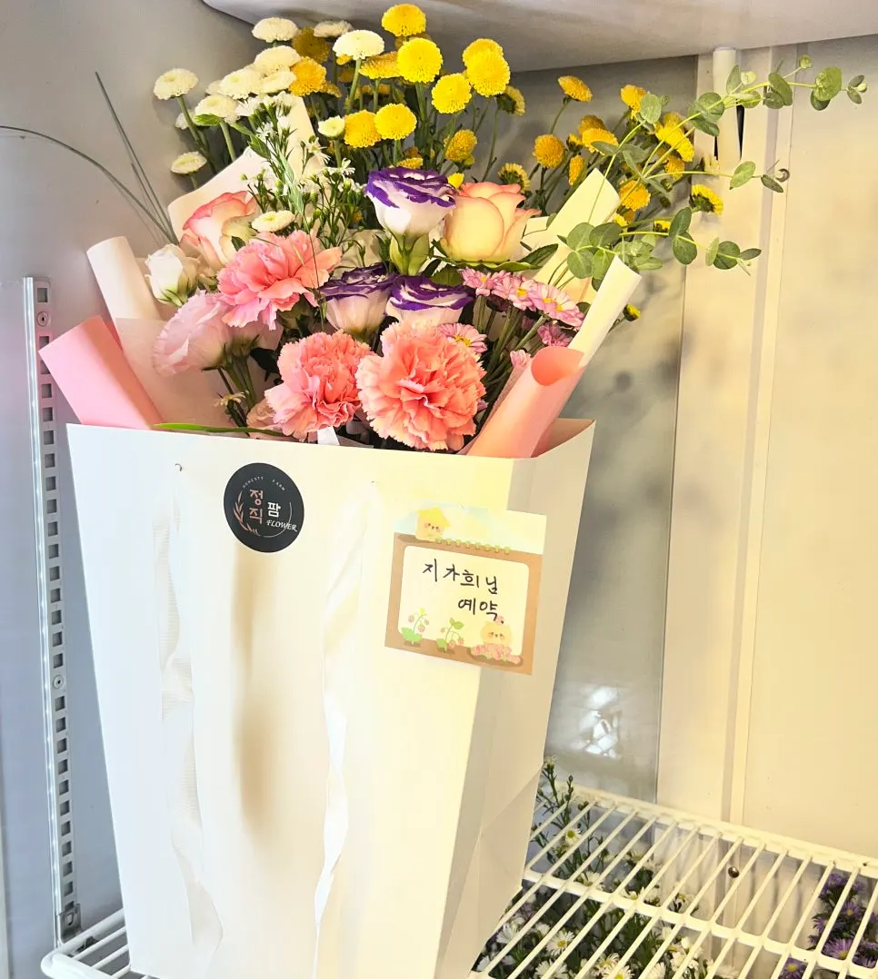 Reserved bouquet prepared with the customer's name written on it