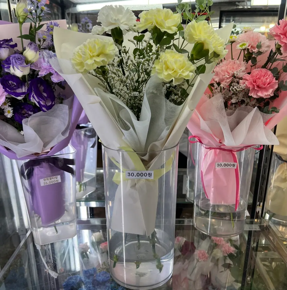 Flower fridge display with price tags attached