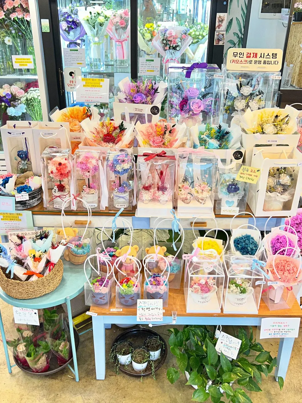 Interior of the shop filled with many types of flowers