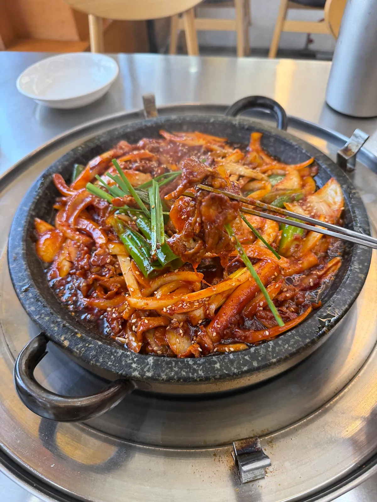 Table spread with hot-plate squid stir-fry at Haetan Hwaseong Byeongjeom
