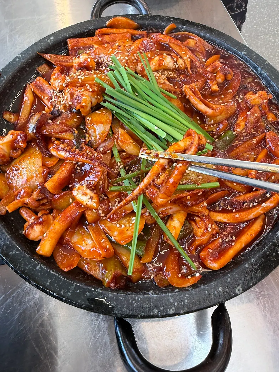 Close-up of smoky-flavored hot-plate squid stir-fry