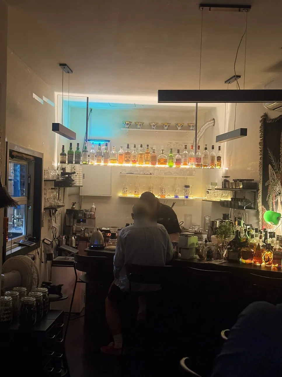 Café seating with a movie playing on a projector