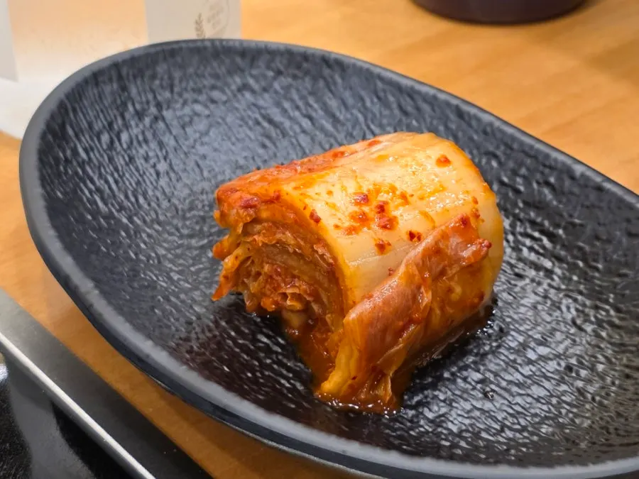 Basic side dishes: corn salad and Gangwon-do napa cabbage kimchi