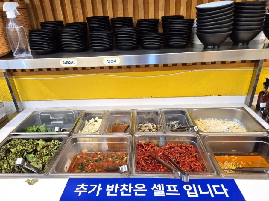 Self-serve bar corner with rice and cold bean sprout soup