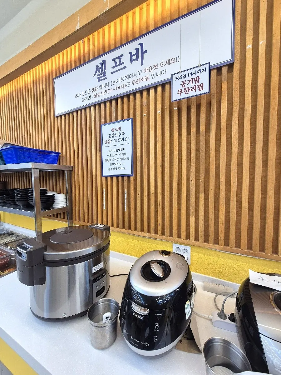 Various side dishes laid out at the self-serve bar
