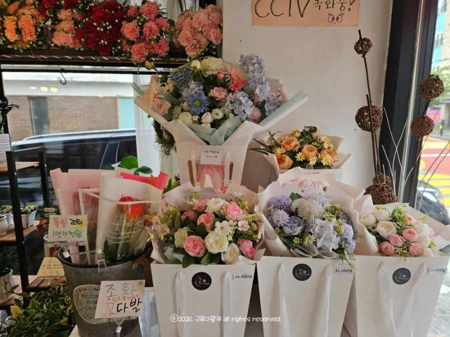 Finished bouquets displayed with price tags