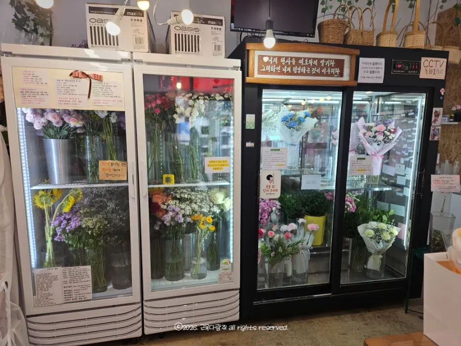 Interior of the shop with fresh flowers in various colors