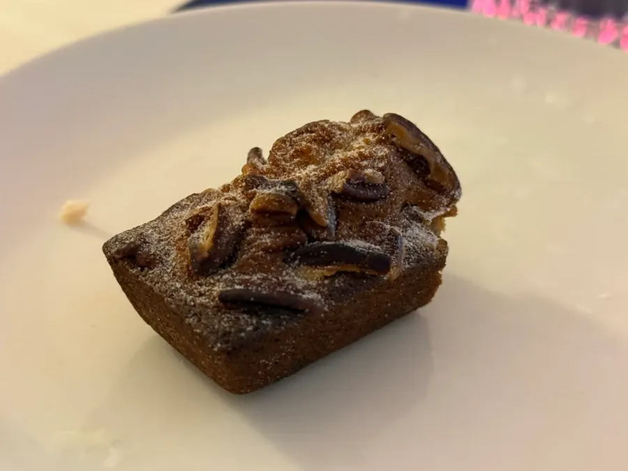 Pecan pie financier topped with pecans
