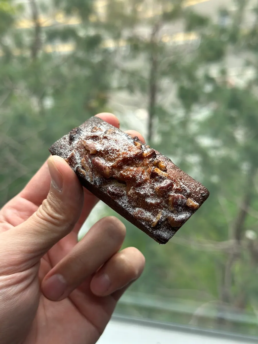 Pecan pie financier piled high with pecans