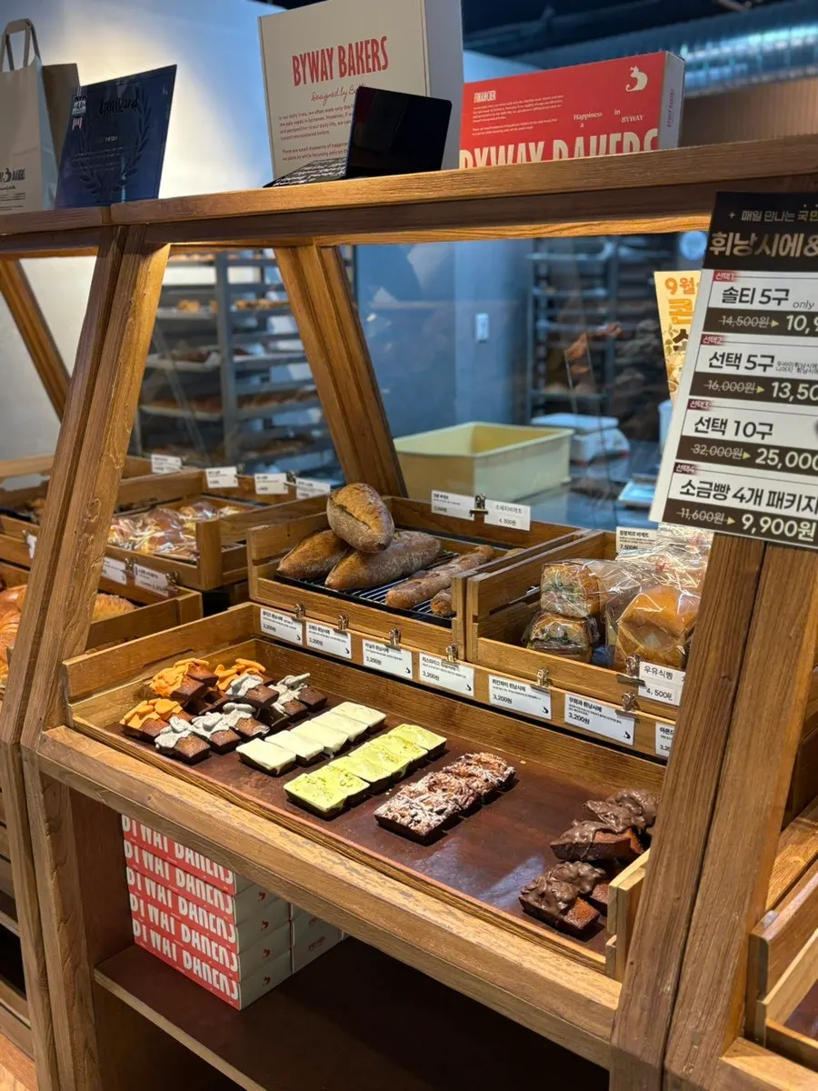 Baked goods and bread neatly displayed in the store