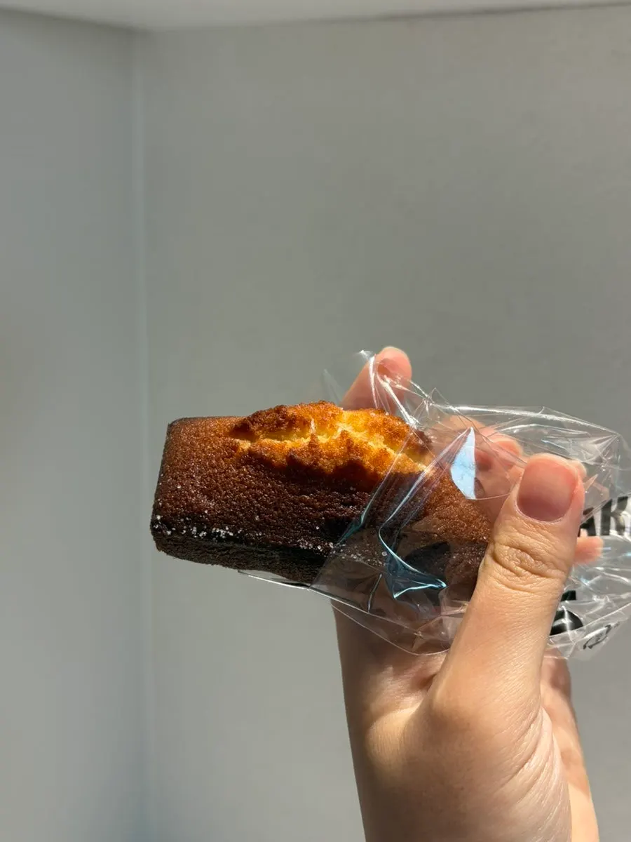 Close-up of a financier on a plate