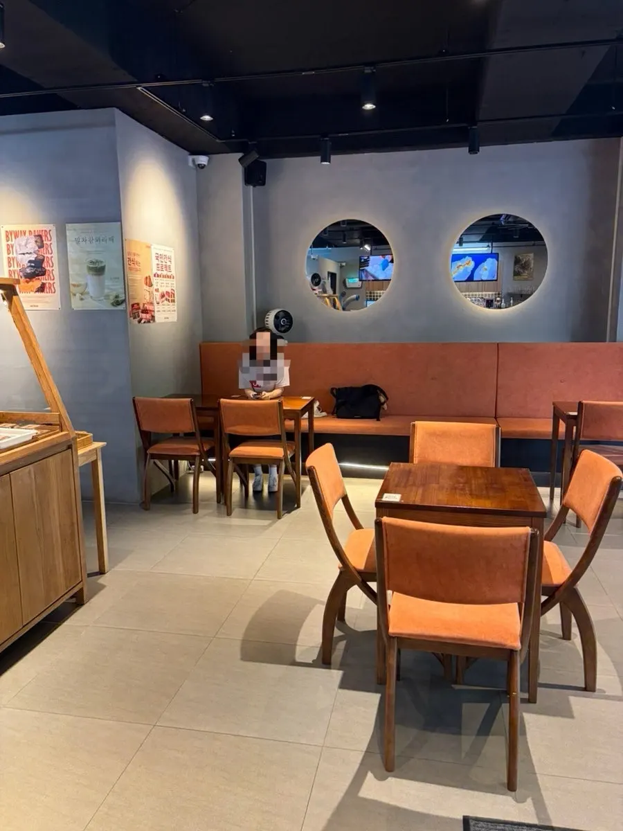 Interior of the café with wood-tone design