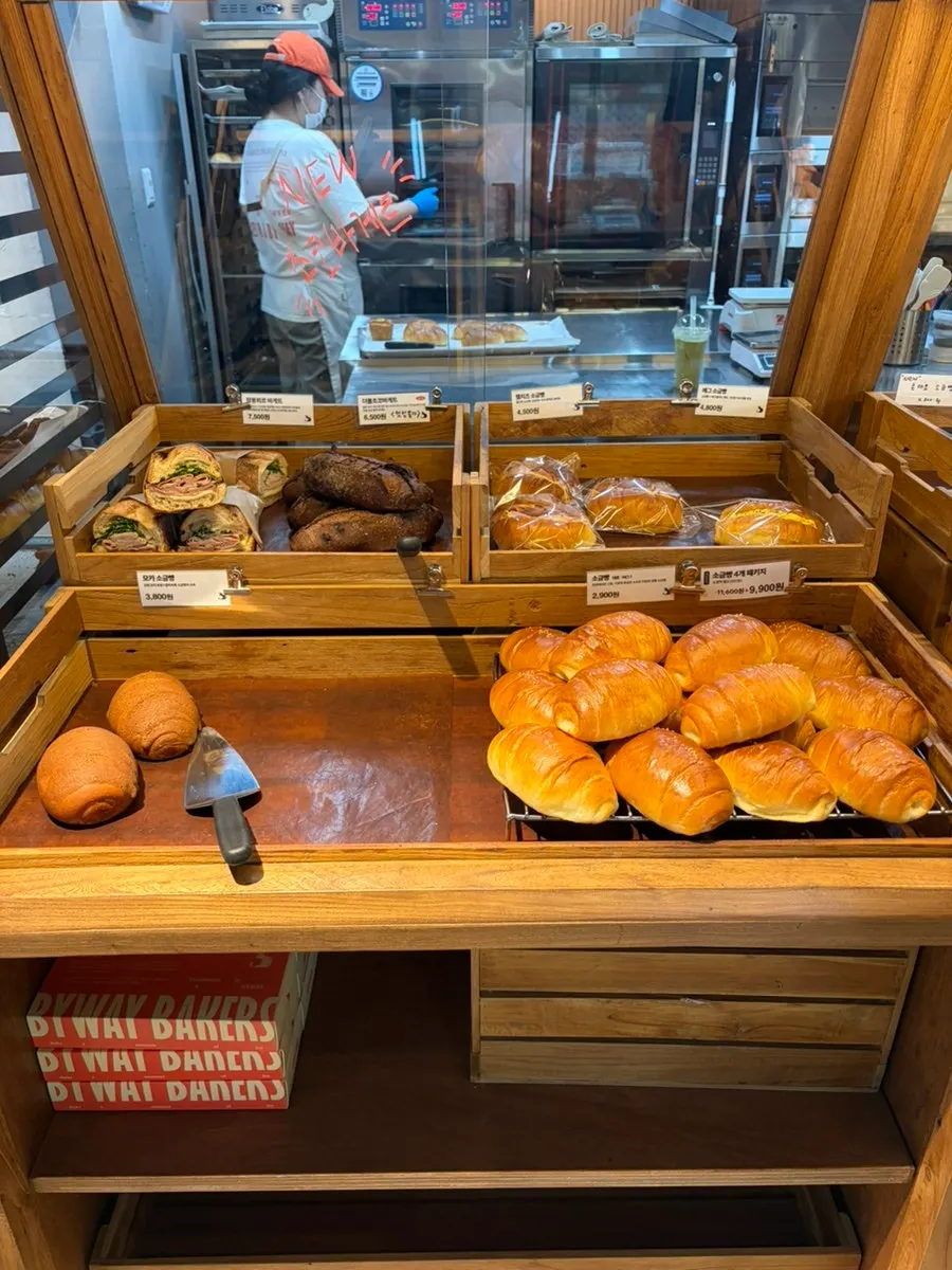 Financiers arranged on the bakery display shelf