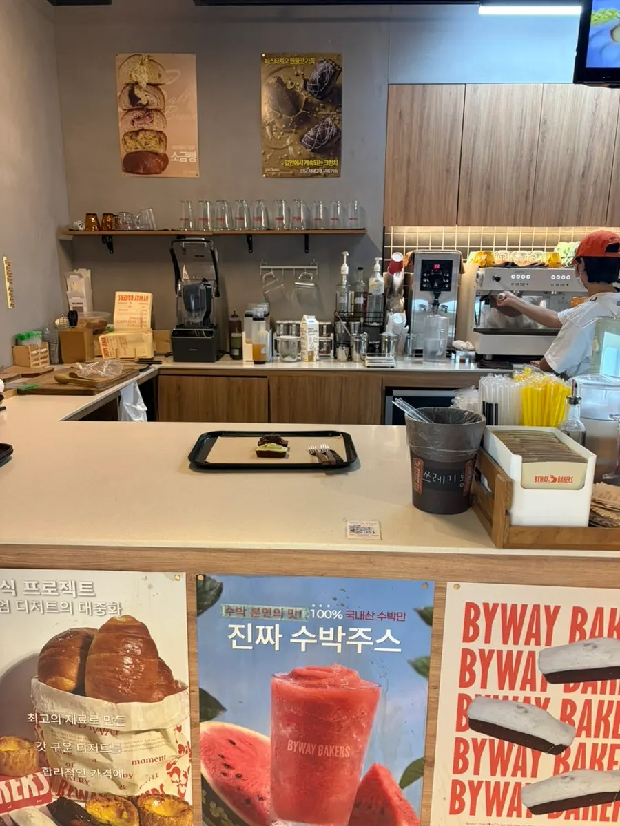 Order kiosk to the left of the counter