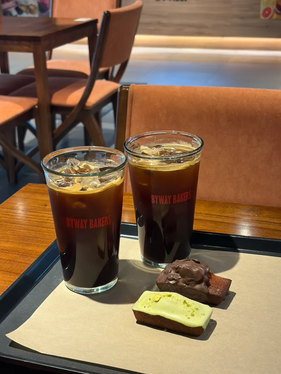 Financiers and iced americano on the table