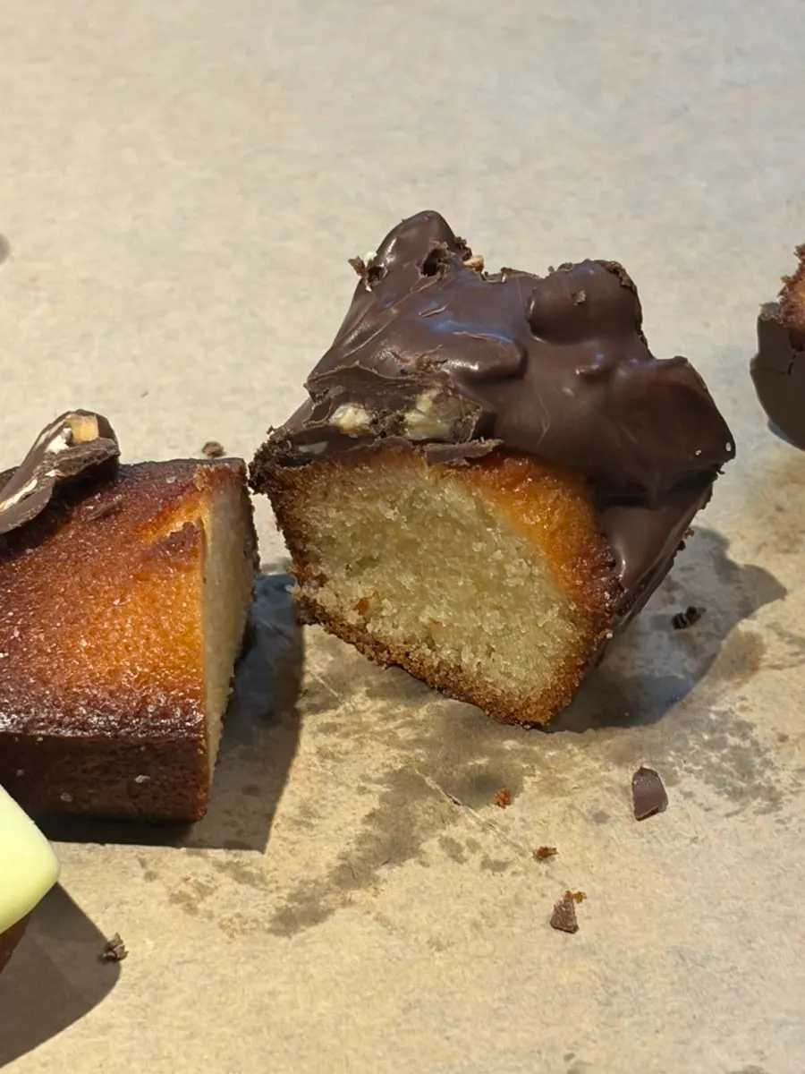 Close-up of the chocolate financier topped with almonds
