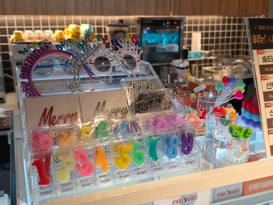 Display of headbands, toppers, and candles for celebrations