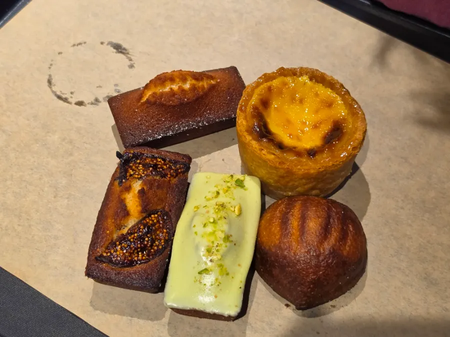 The ordered 3 financiers, egg tart, and butter rice cake