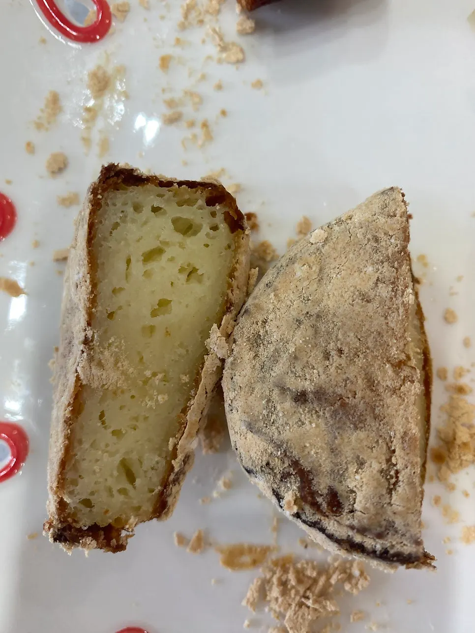 Cross-section of a bitten injeolmi butter rice cake