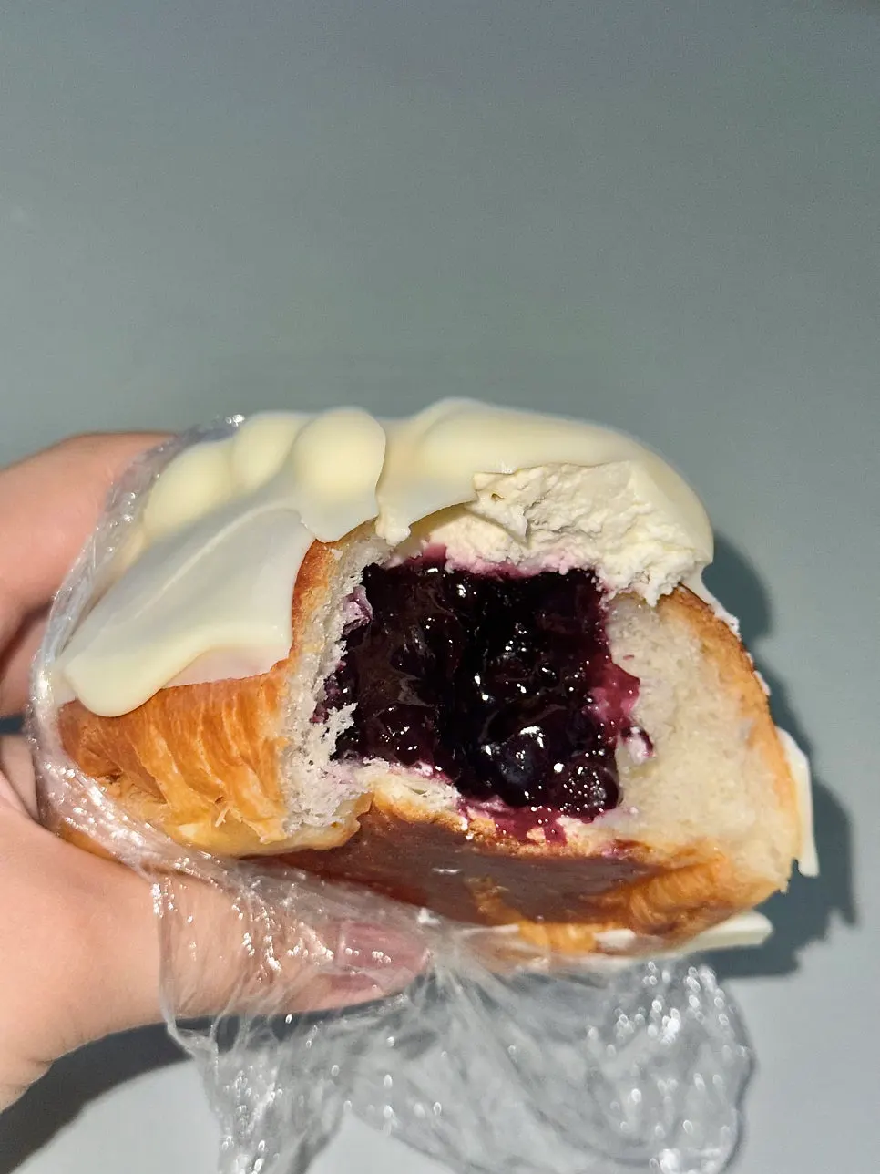Cross-section of salt bread studded with fresh blueberries