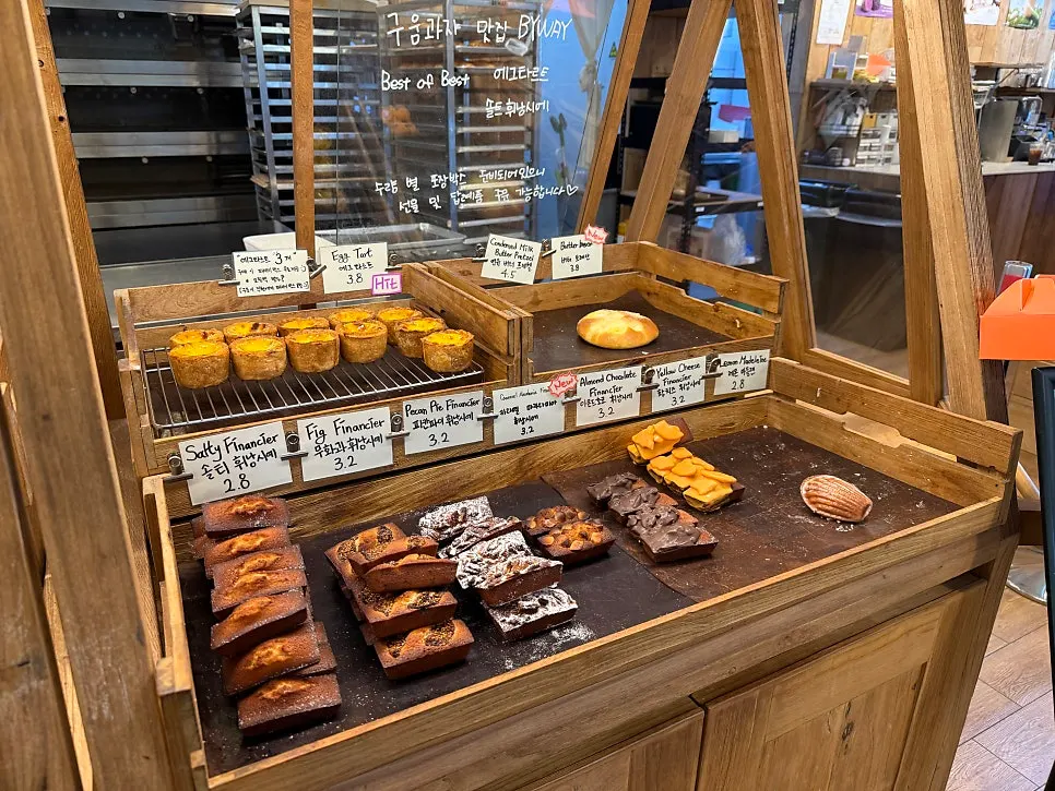 Bakery display case with a variety of breads