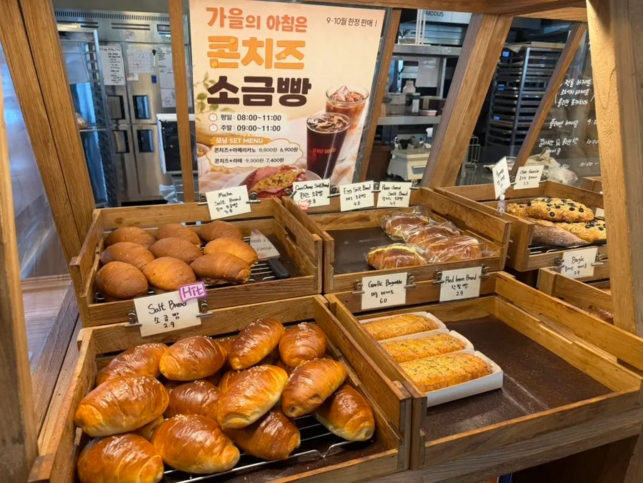 Display case of tarts and slice cakes