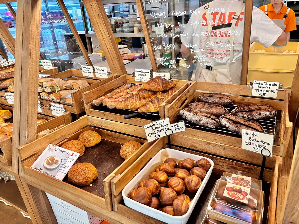 Bakery display with salt bread and financiers