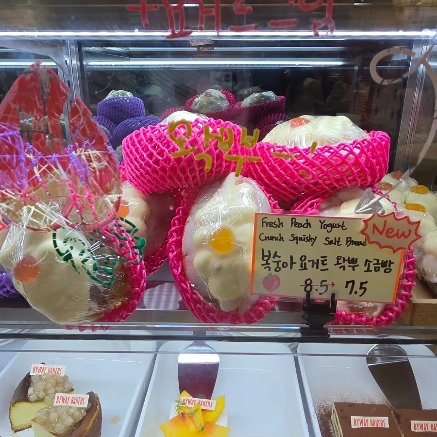 Peach yogurt wakppu salt bread marked with a New sign