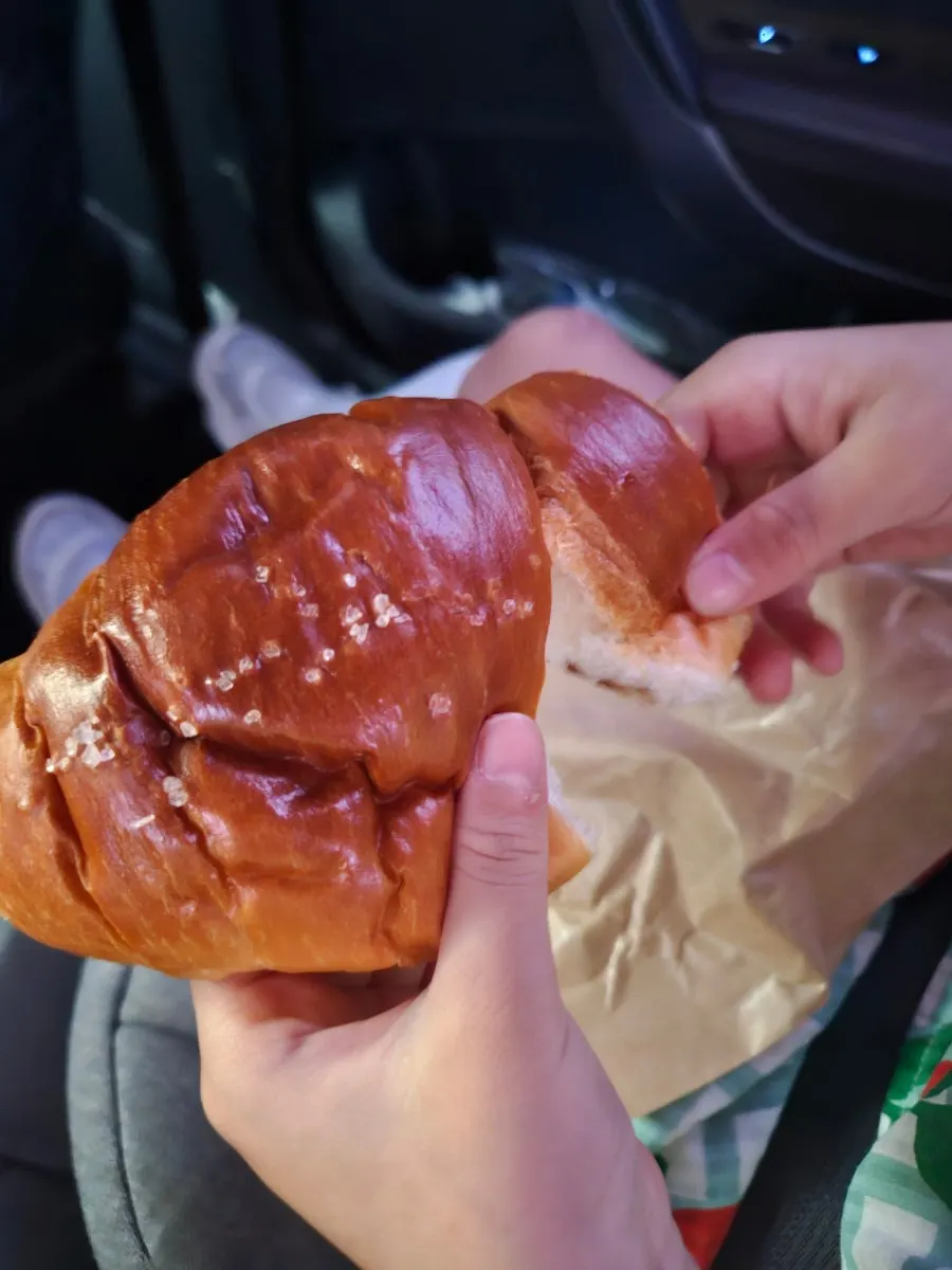 Butter bresan held in hand