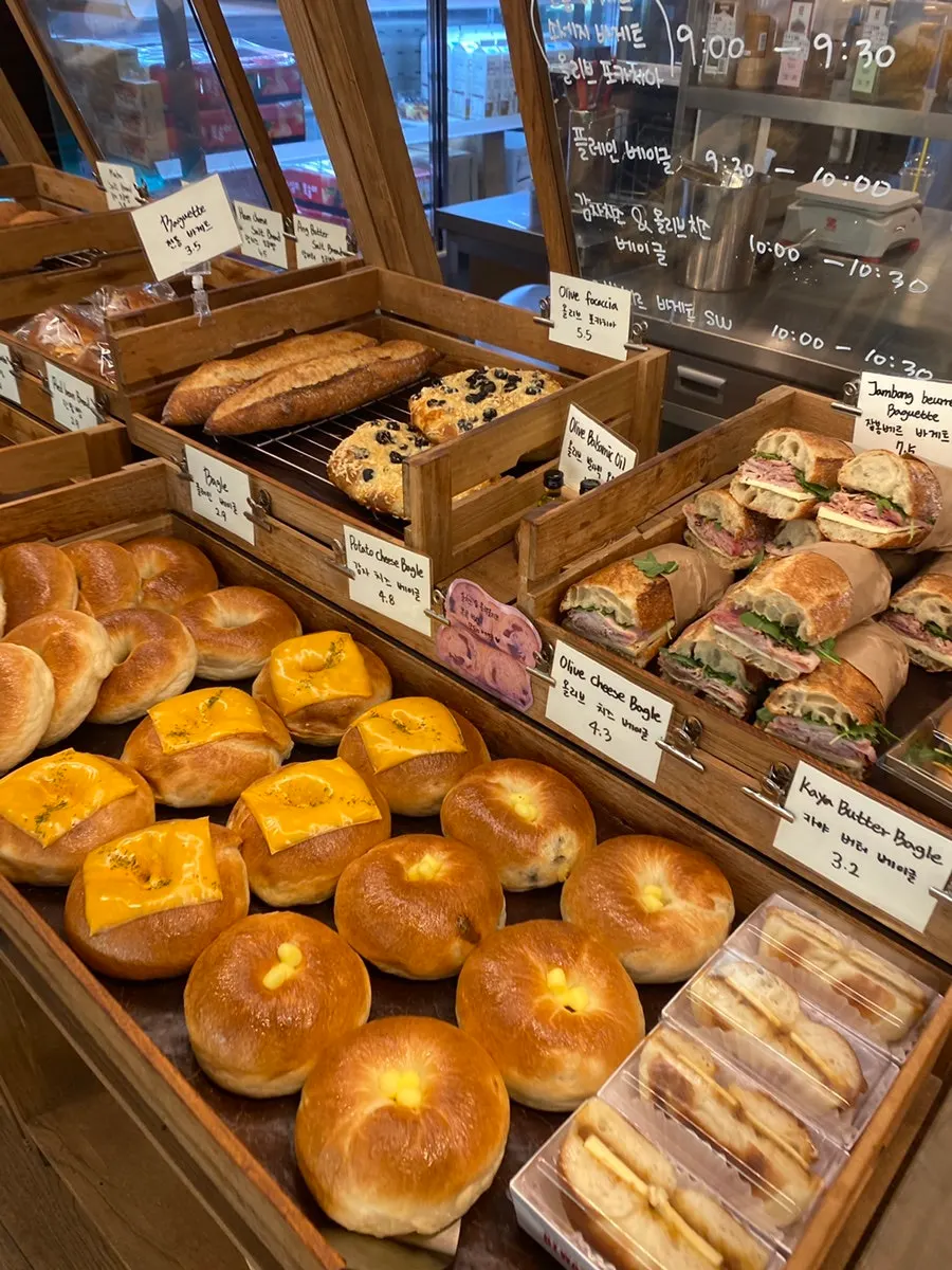 Shelf with bagels and croissants