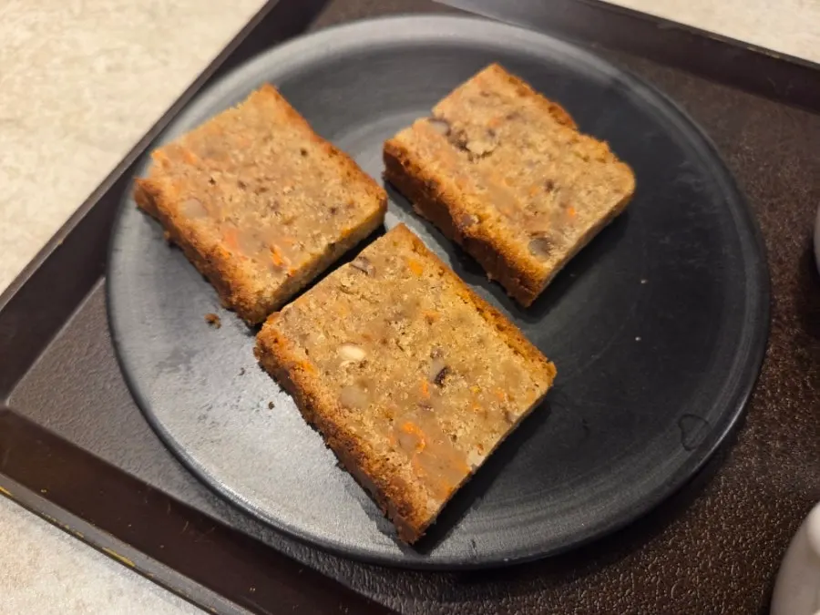 Mini carrot cake, blueberry yogurt, and coffee dessert