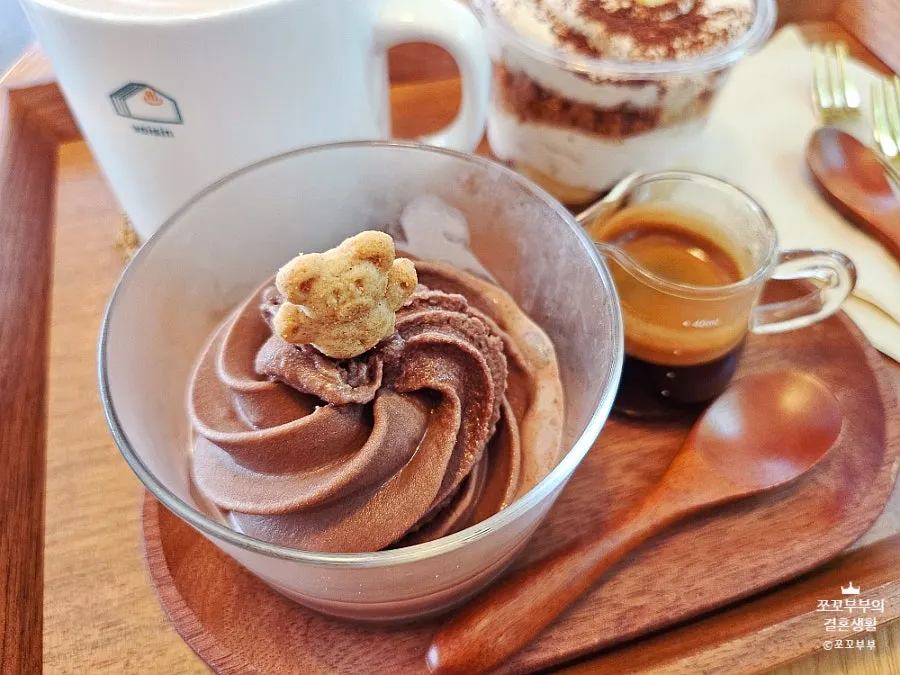 Table with dessert and drink placed together