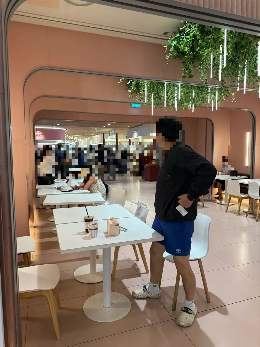 Customers seated at Café Diaz on a weekday afternoon