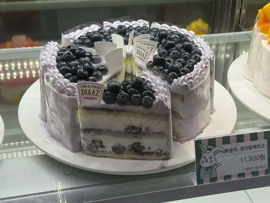 Peach slice cakes displayed at Café Diaz