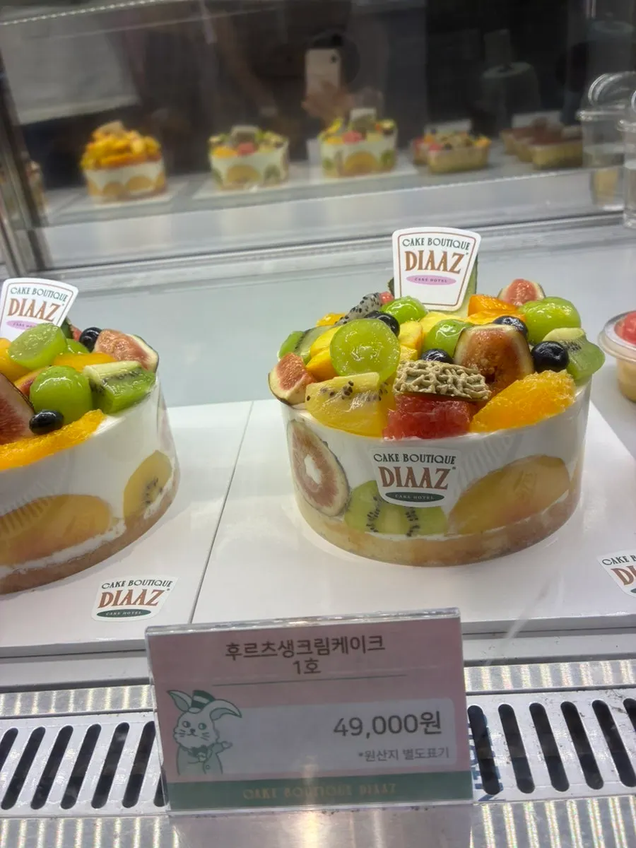 Cross-section of the cup fruit dessert eaten with a spoon