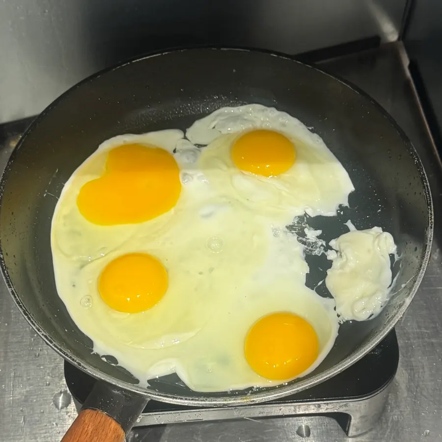 Frying an egg in a pan