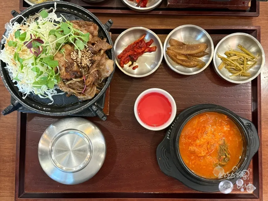 Two full Cafe Dongyi set meals covering the table