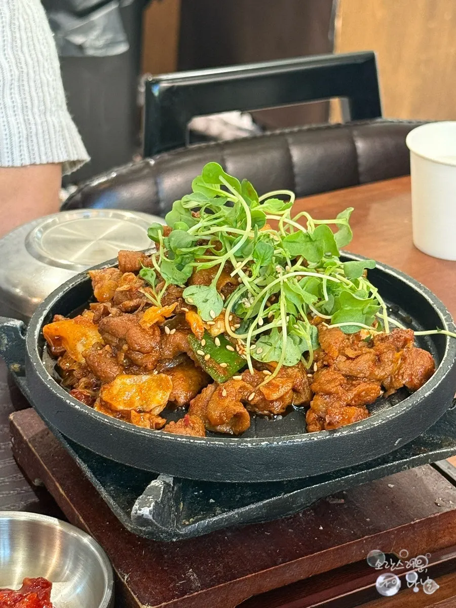 Kimchi jjigae broth loaded with meat