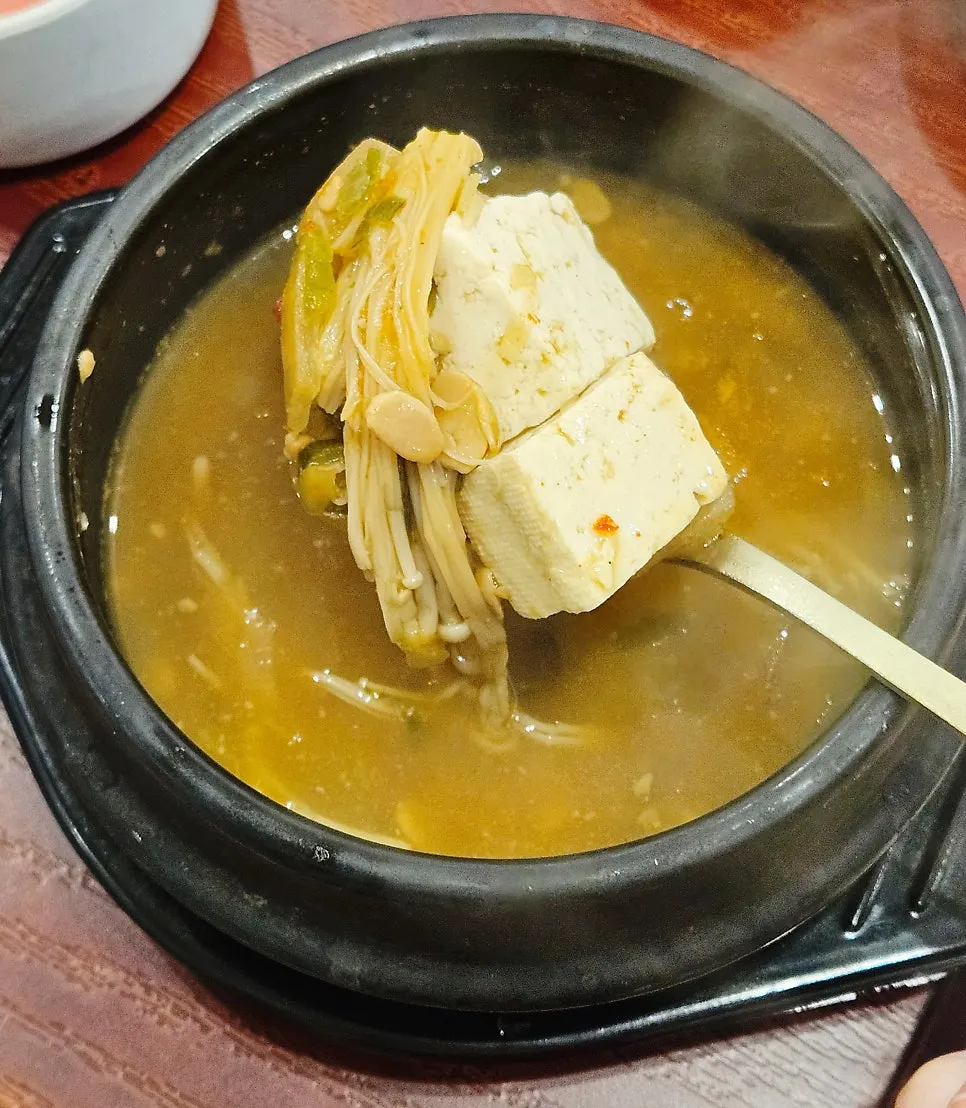 Doenjang jjigae with tofu and enoki mushrooms