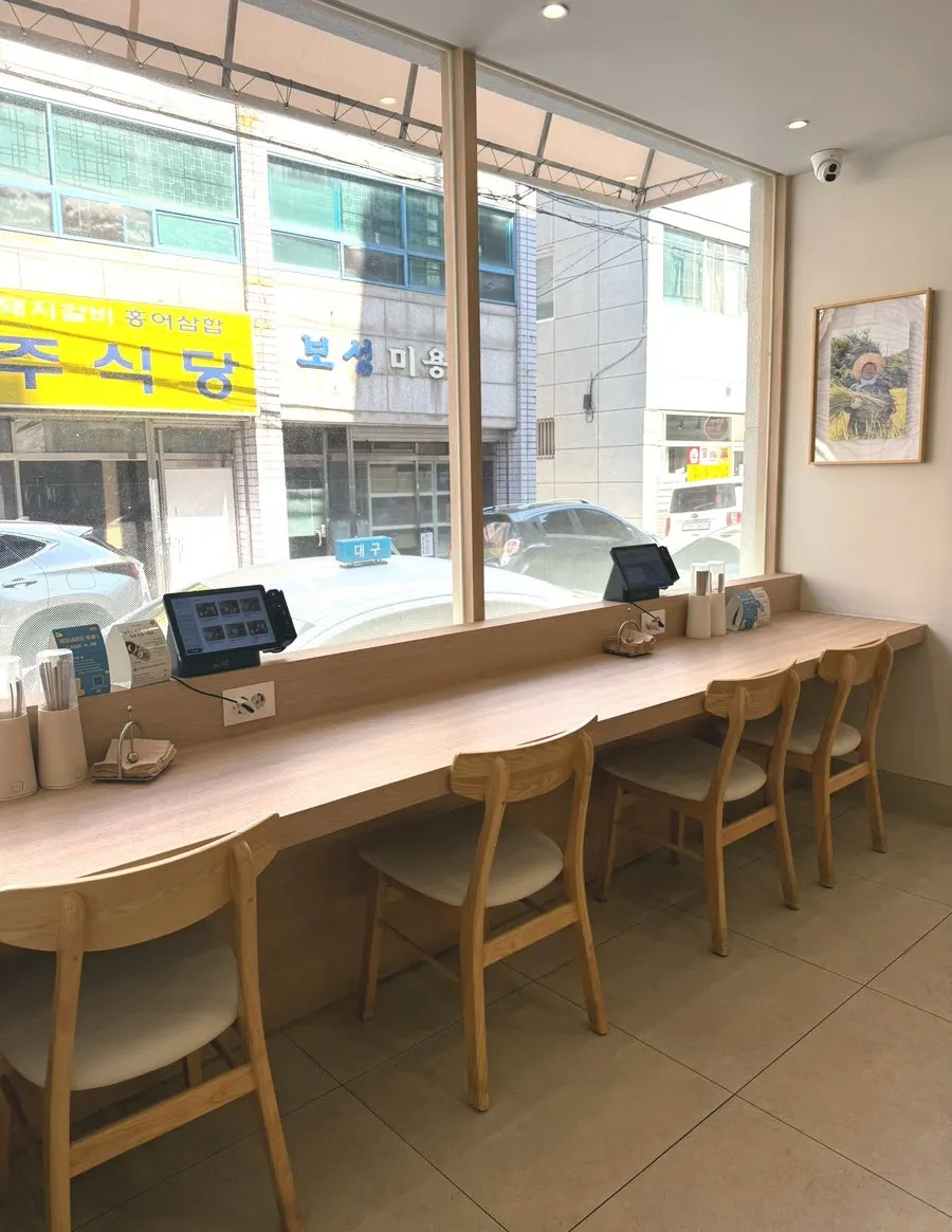 Bar seats for solo dining and square tables