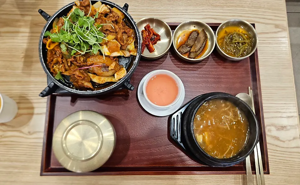 Hearty doenjang stew and charcoal-grilled pork spread