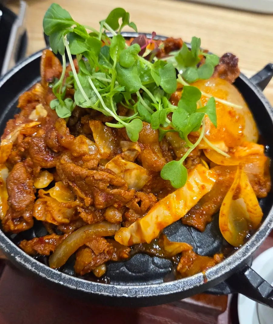 Grilled pork bulgogi over the solo brazier