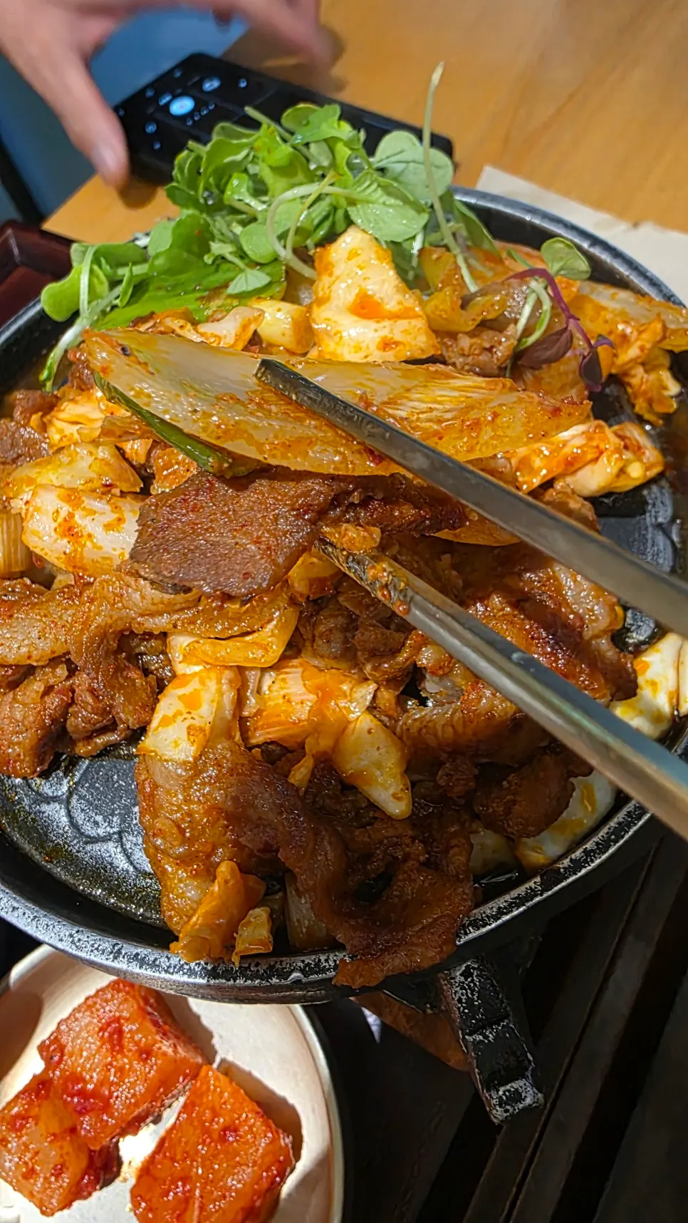 Grilled jeyuk coated in glossy red seasoning