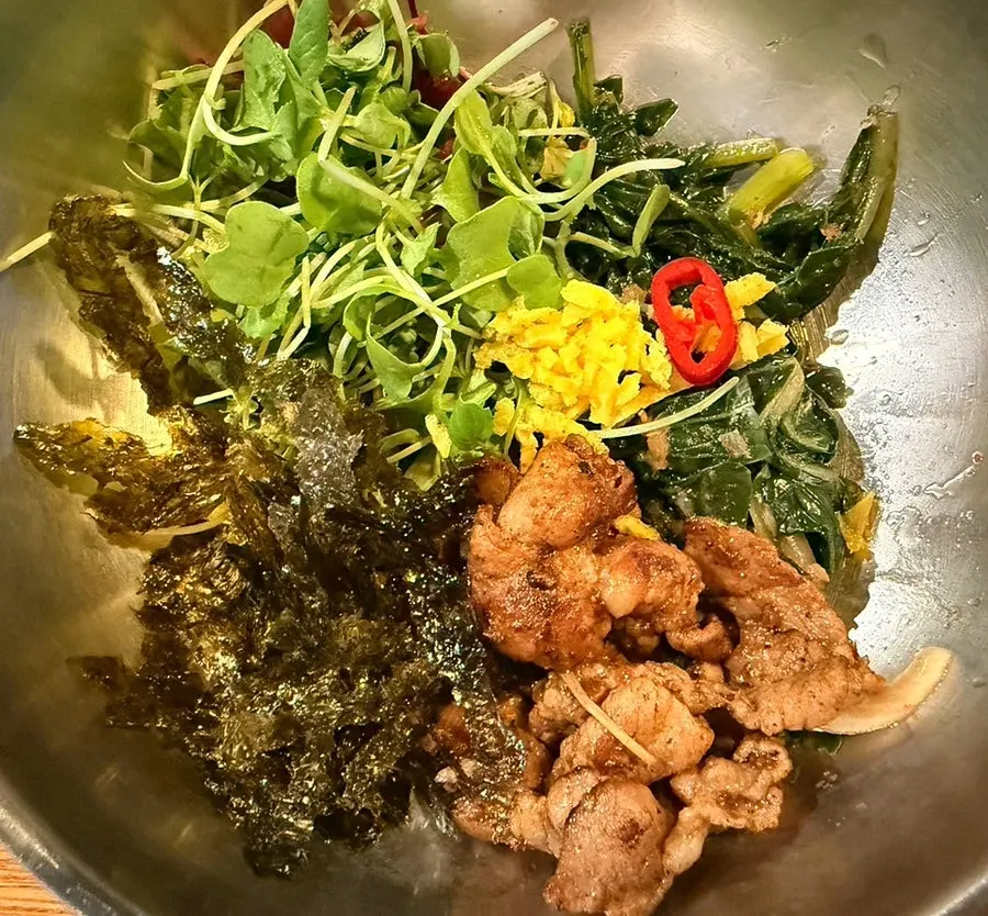 Side dishes served with the yeolmu tuna bibimbap