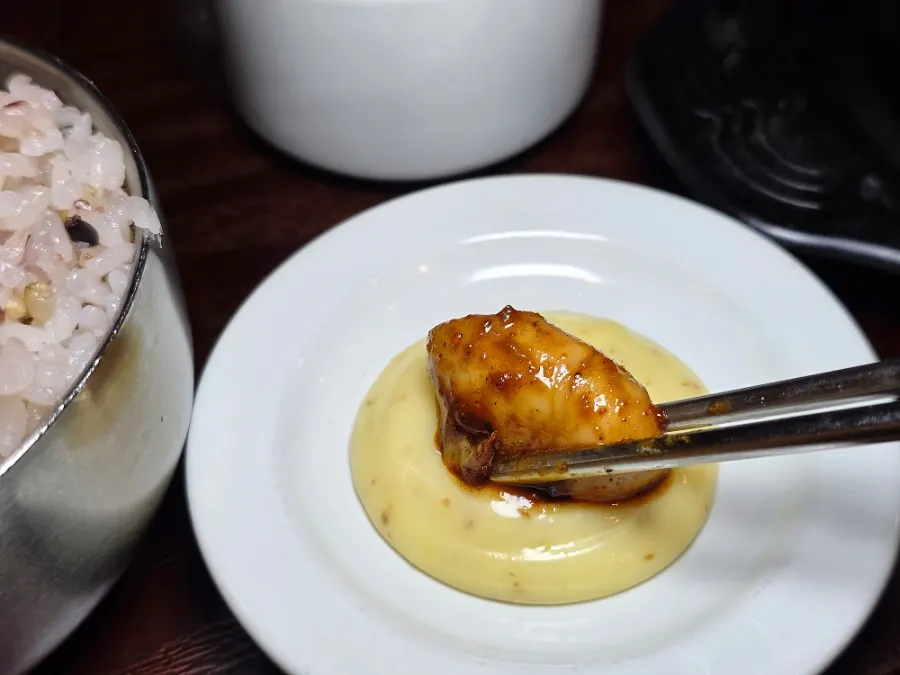Baby octopus dipped in mayo sauce