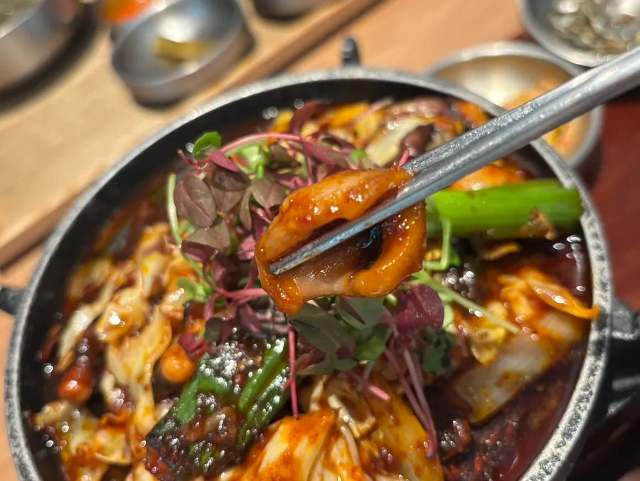 Stir-fried octopus and doenjang stew on the tabletop grill
