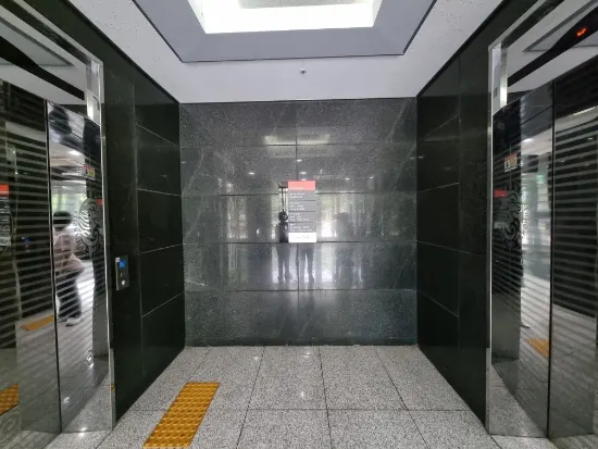 Interior corridor near the elevator inside the Cheonma Art Center building