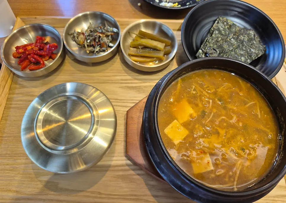 Tofu doenjang jjigae bubbling as it cooks