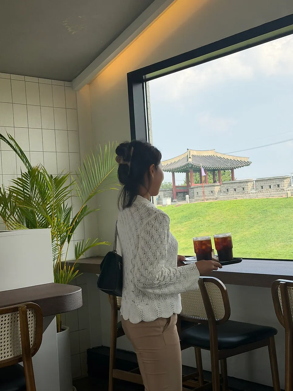 Hwaseong Fortress wall view from the upstairs window seats at Caffeine Focus