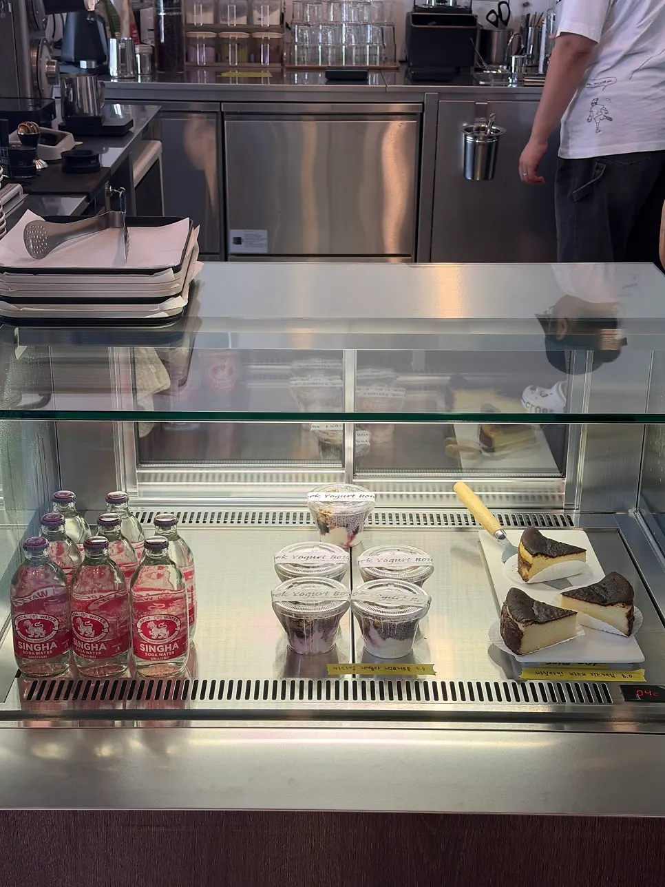 Dessert display case and ingredients at Caffeine Focus